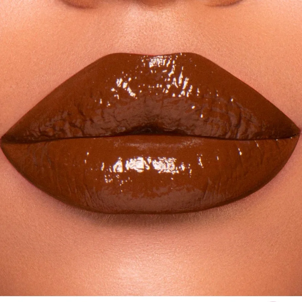 97. Jeffree Star DOMINATRIX Supreme Gloss Dark Brown Lip Gloss